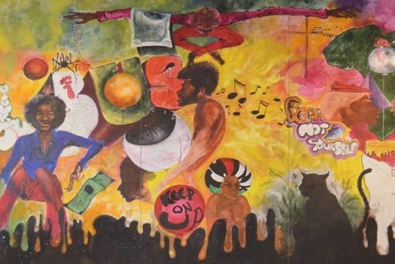 This image is "one of a series of murals covering the walls of the Center of Pan-African Culture at Kent State University's Oscar Ritchie Hall."