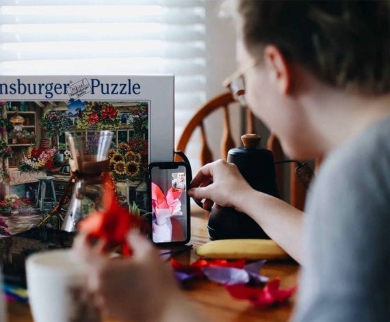 Photo of a consumer building a puzzle