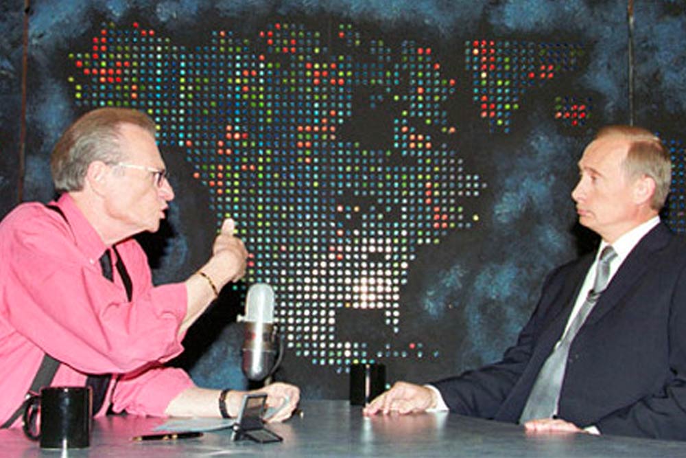Photo of Larry King interviewing Vladimir Putin