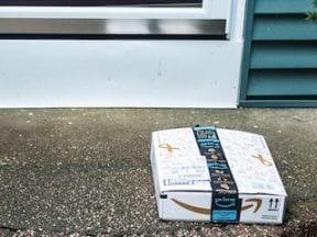 Photo of an Amazon package on a front porch
