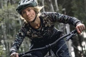 Image from Erik's home page of a lady riding a mountain bike