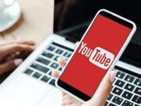 Image of a smartphone with YouTube logo on the screen