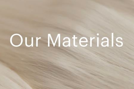 Screenshot from Everlane's website with text "Our Materials" behind an image of cotton