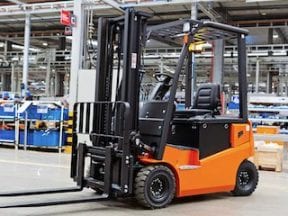 Photo of a forklift in a warehouse