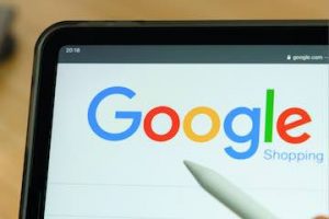 Image of a tablet the Google Shopping logo on the screen