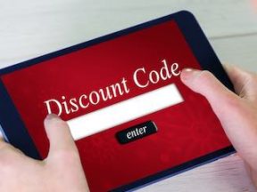 Photo of a tablet with a discount code box on the screen
