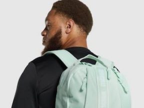 Image from Gymshark of a male wearing a backpack