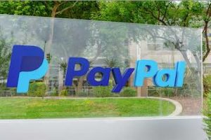 Photo of a PayPal sign in front of an office building