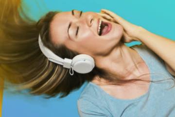 Image from Splice app of a female with headphone shouting