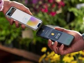 Photo from Apple of two iPhones demonstrating tap to pay