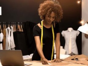 Photo of a Black female apparel merchant