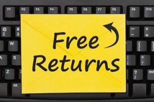 Free Returns message on an envelope on black keyboard for your online sales
