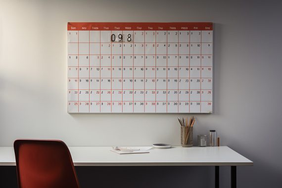 Photo of a large calendar on an office wall