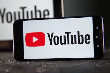 YouTube logo on a smartphone screen