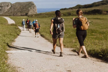 Photo of hikers on the Camino de Santiago from the REI blog