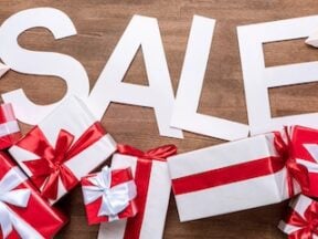 Image of Christmas packages with the word "SALE" above them