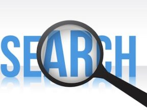 Magnifying glass above the word "Search"