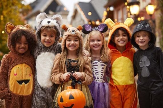 AI image of grade-school-age kids trick or treating.