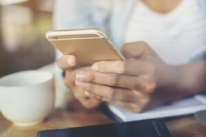Female hands holding a smartphone