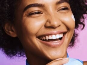 Image from Shopline of a female laughing