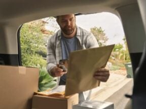 Image from Veho of a male delivering a parcel