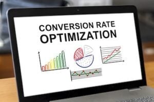 Illustration of a laptop screen with words "Conversion Rate Optimization" on the screen