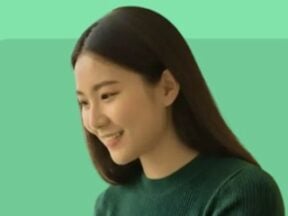 Image from WizCommerce of a female looking at a computer