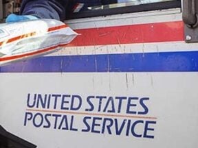 Image of USPS logo on the side of a delivery truck