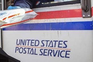 Image of USPS logo on the side of a delivery truck