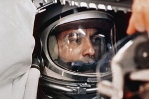 Photo of Alan Shepard in a space suit in the Mercury capsule