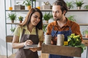 Stock photo of a female and male in a florist shop