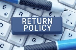 Illustration of "Return Policy" text on a keyboard