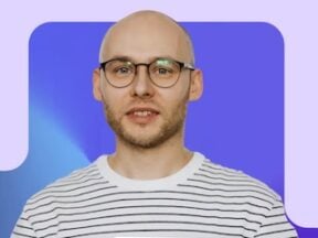 Image from Yuma AI of a male holding a computer tablet