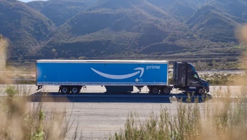 Photo of an Amazon semi-truck on a highway Photo of an Amazon semi-truck on a highway