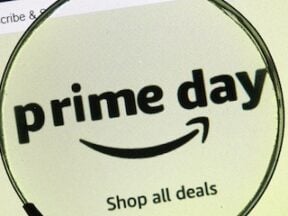 Prime Day logo behind a magnifying glass