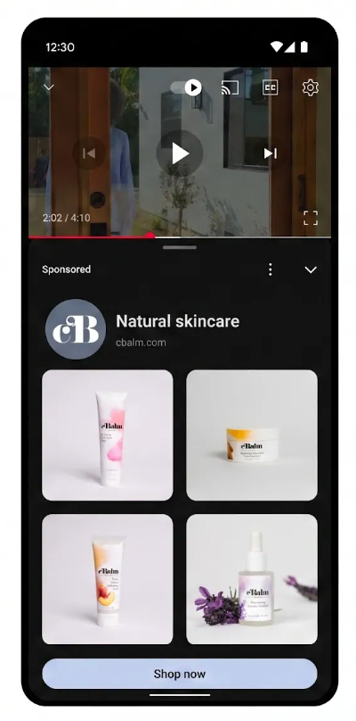 Google ad format on a mobile video: a paused YouTube clip with a sponsored "Natural skincare" product carousel from cBalm below it, showing four skincare items and a "Shop now" button. Google ad format on a mobile video: a paused YouTube clip with a sponsored "Natural skincare" product carousel from cBalm below it, showing four skincare items and a "Shop now" button.