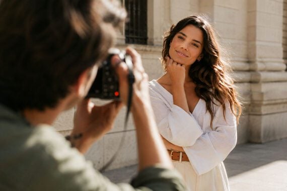 Image of a young woman posing for a photo outside
