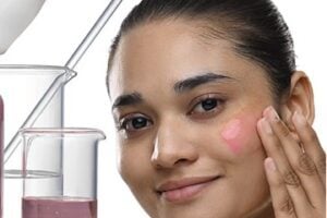 Image from Minimalist of a female applying skin lotion
