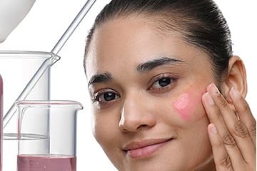 Image from Minimalist of a female applying skin lotion