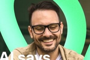 Image from Trustpilot of a male looking at a smartphone