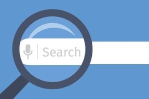Illustraton of the word "Search" behind a magnifying glass