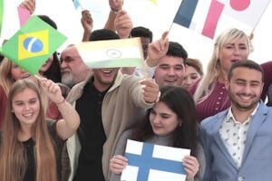 Image of a group of shopppers holding their country flags