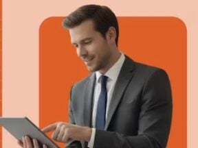 Image from WizCommerce of a male holding a laptop computer