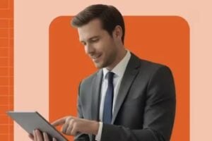 Image from WizCommerce of a male holding a laptop computer