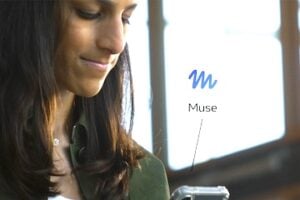 From Meta, photo of a female holding a phone with "Muse" speech bubble beside it