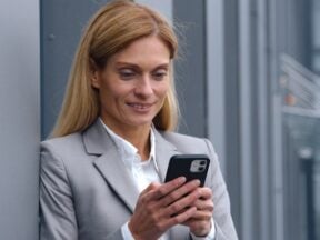 Professional female looking at her phone