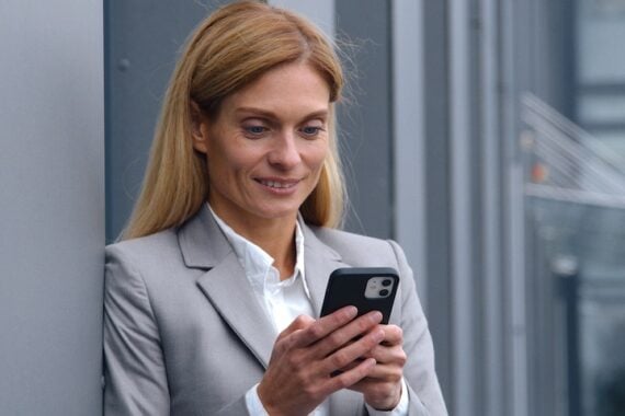 Professional female looking at her phone