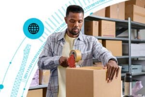 Image from FedEx.com of a male preparing a shipping box